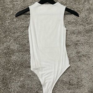 Kids White Sleeveless One Piece